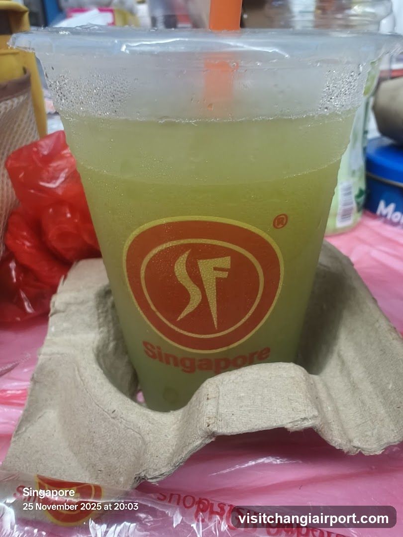 Green beverage in a cup with logo