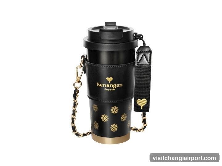 Black coffee cup with gold accents