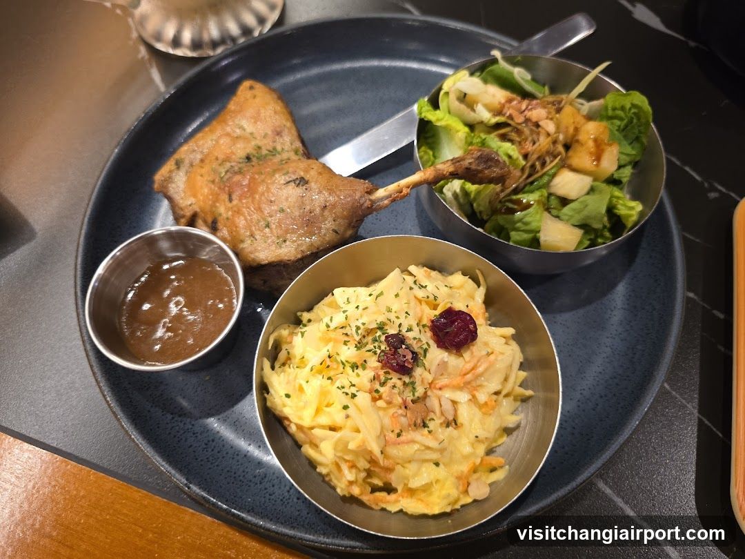 Duck Leg Meal with Salad and Mashed Potatoes