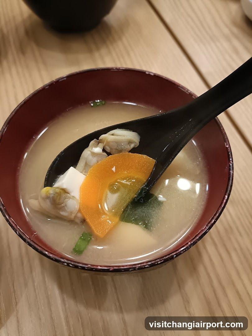 Soup Bowl with Clams and Egg Yolk