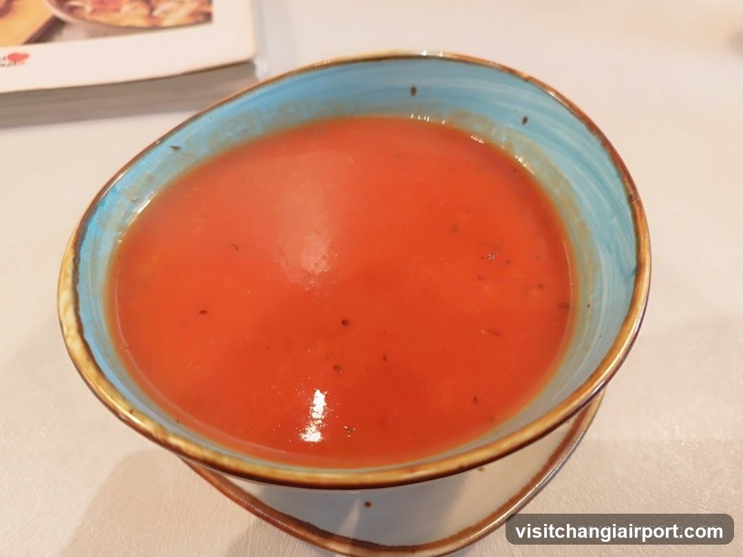 Red Soup in Ceramic Bowl