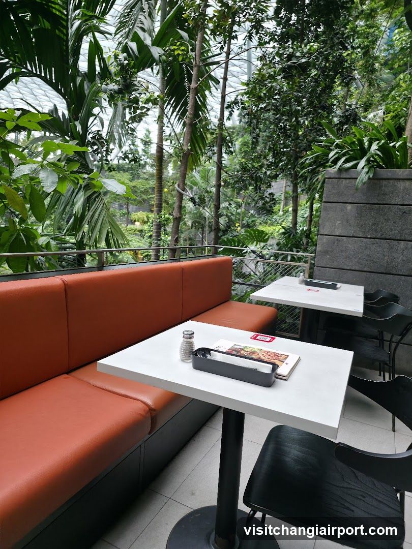 Indoor Dining Area with Greenery View