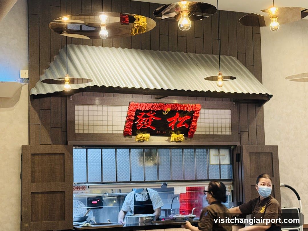 Restaurant Interior with Staff and Kitchen View