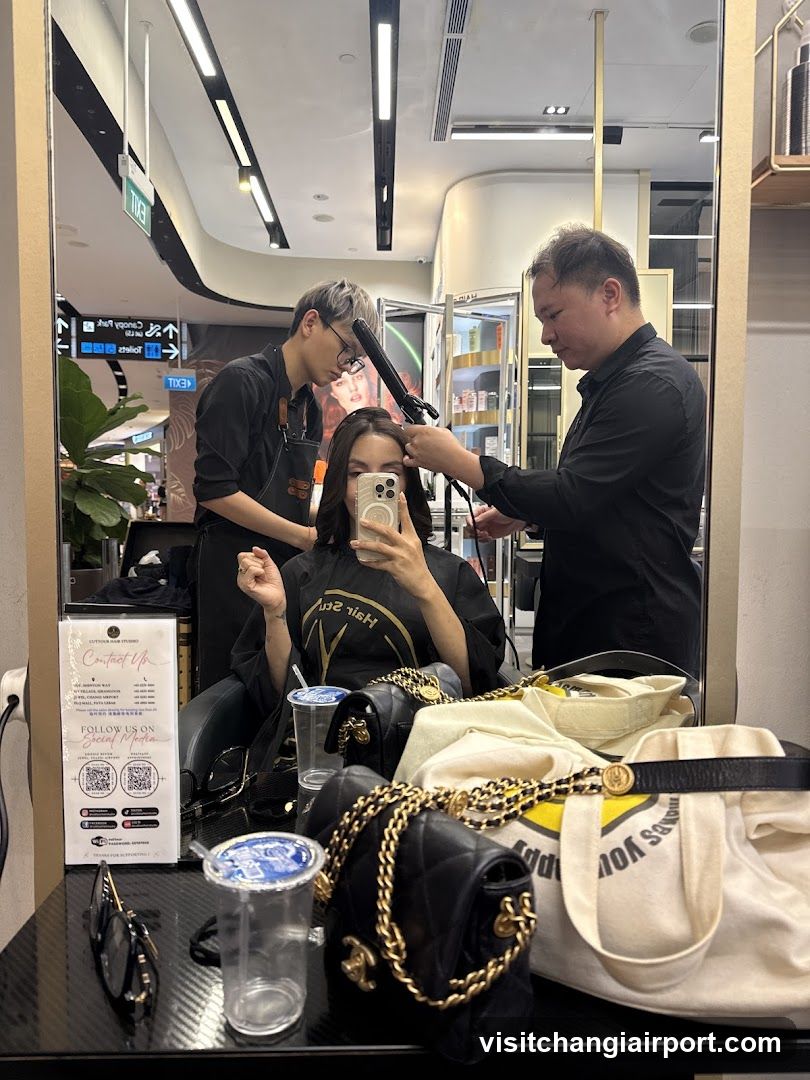 Hair Salon Interior with Stylists and Customer