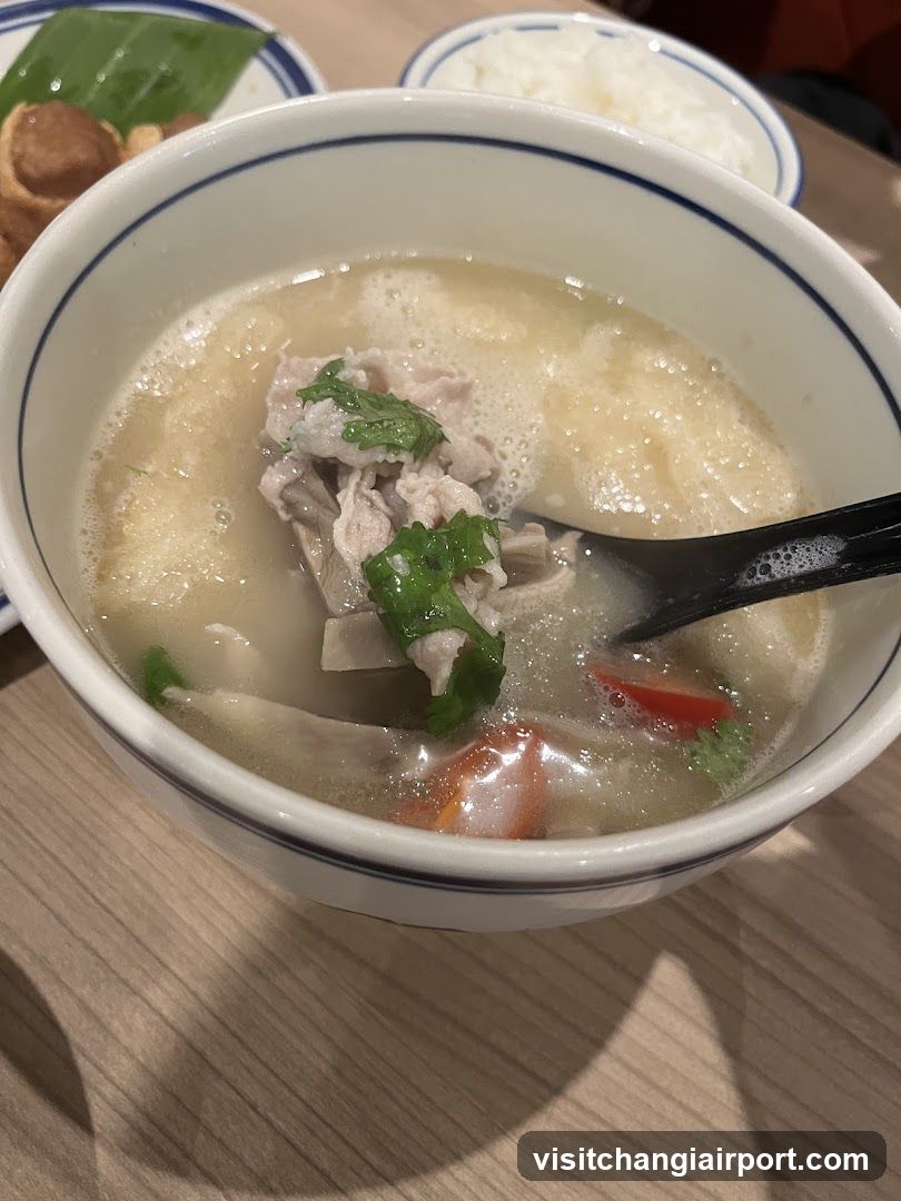 Bowl of Soup with Meat and Vegetables
