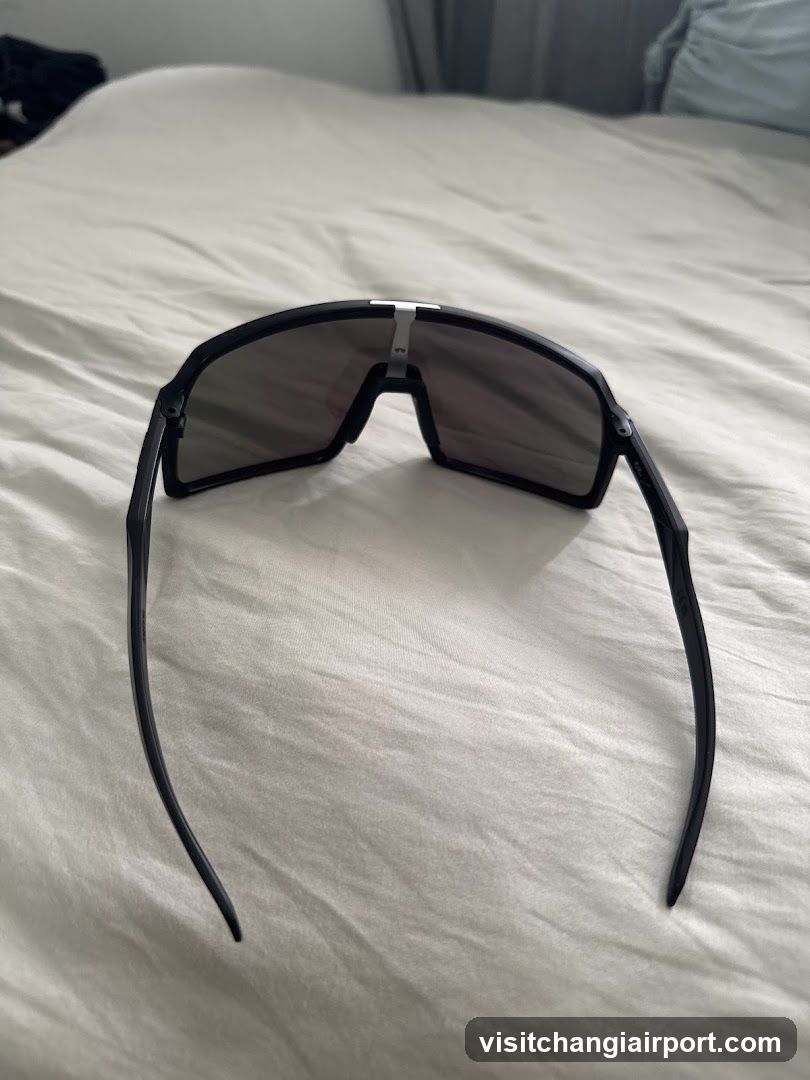 Sunglasses on Bed