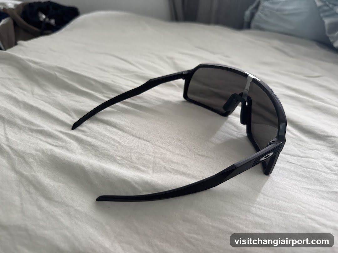 Sunglasses on Bed