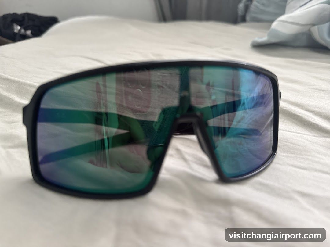 Sunglasses on Bed