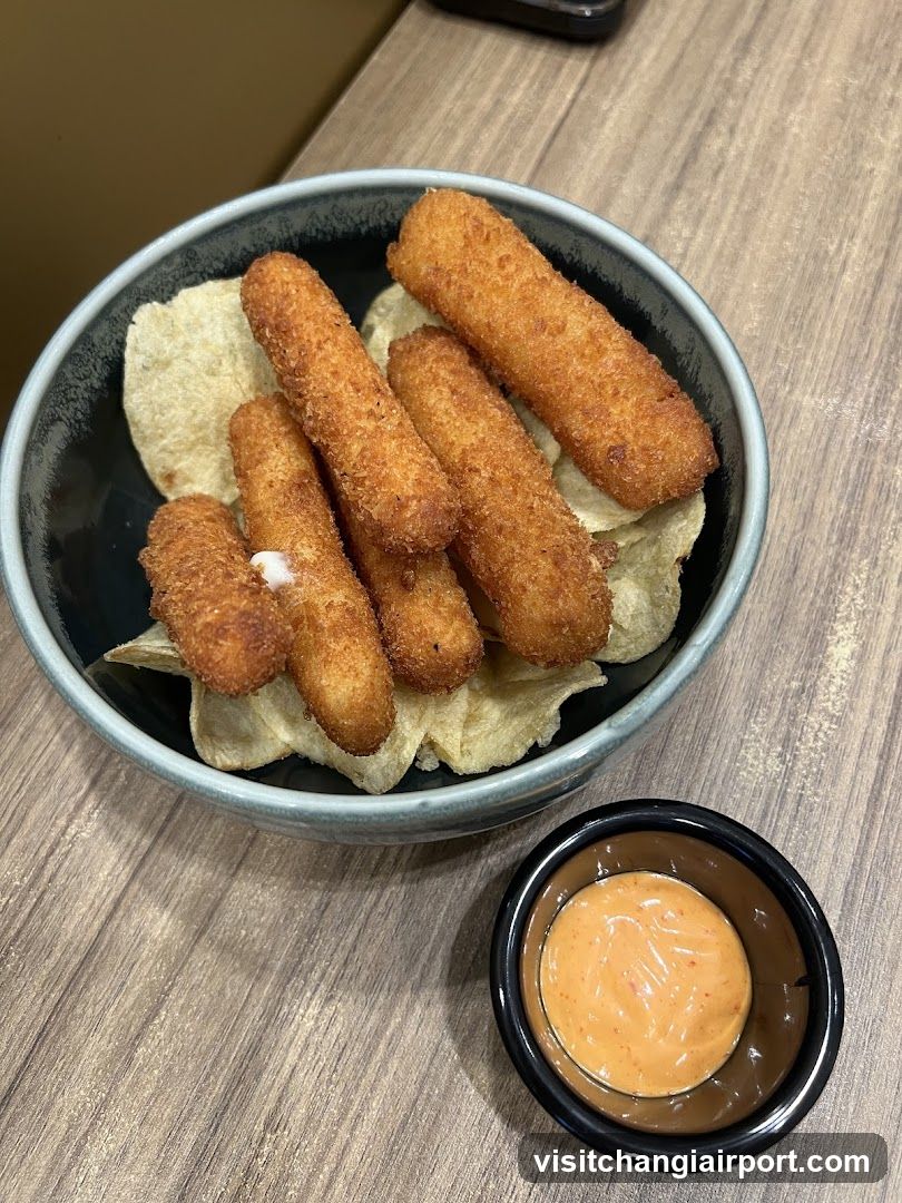 Fried Mozzarella Sticks with Chips and Sauce