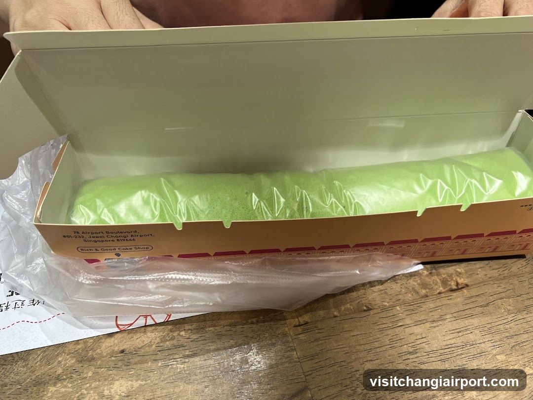 Green cake roll in box