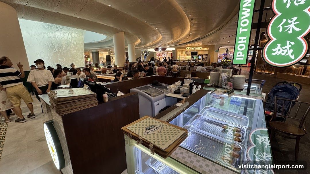 Food Court Interior with Display Case and Crowd