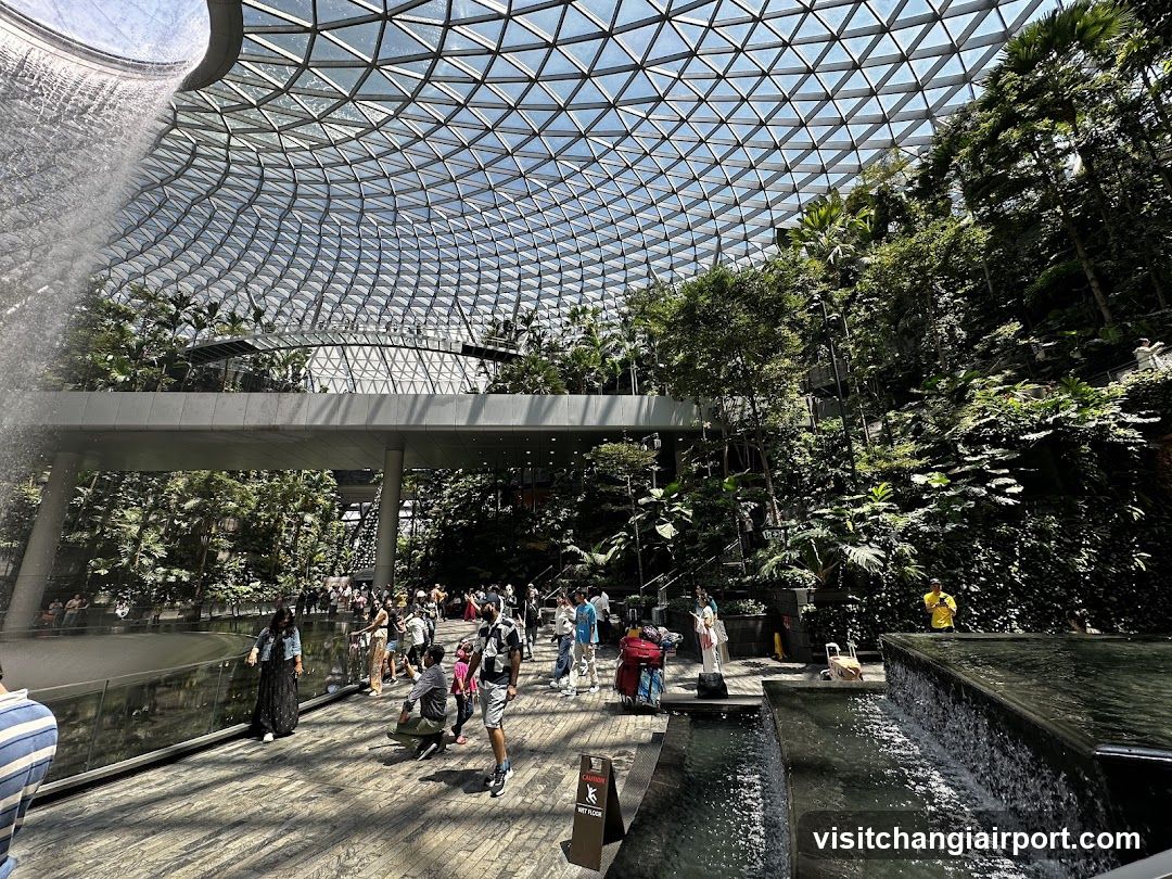 Indoor Garden with Waterfall and Visitors