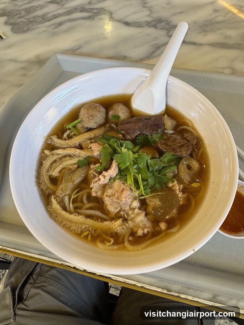 Bowl of Noodle Soup with Meatballs and Beef