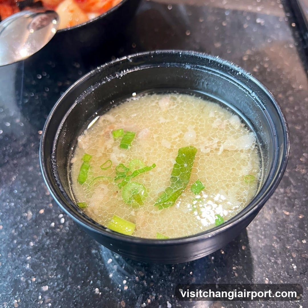 Bowl of Soup with Green Onions
