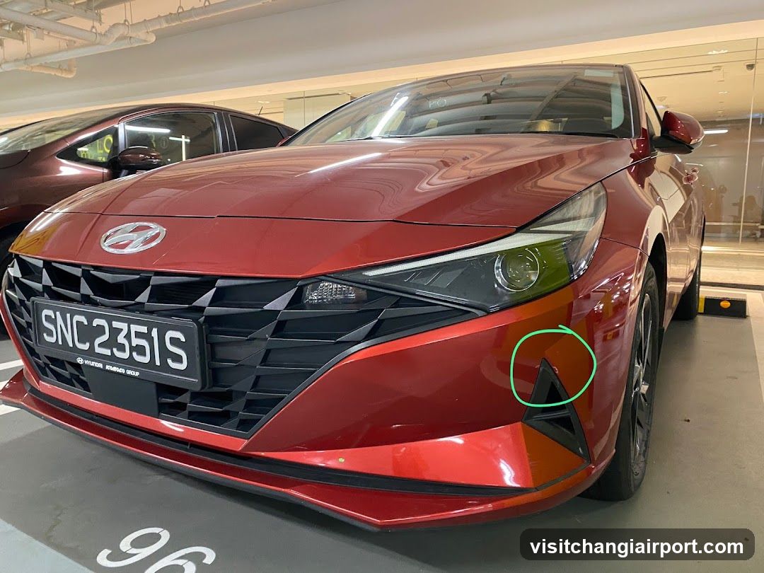 Red Hyundai Elantra in Parking Garage
