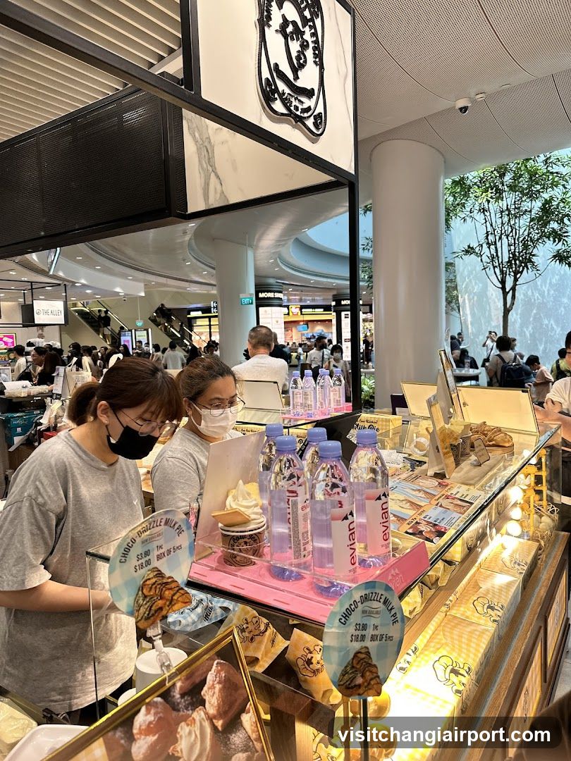 Food stall interior with staff and products