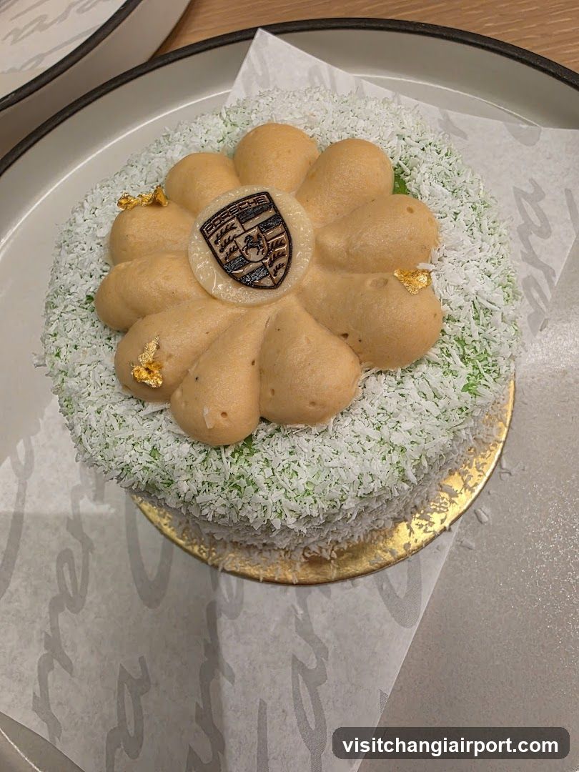 Decorated Cake with Gold Leaf and Logo