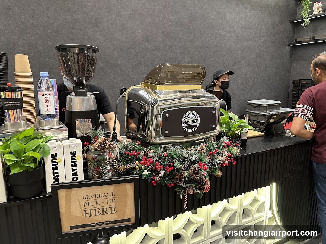 Coffee Shop Interior with Staff and Equipment