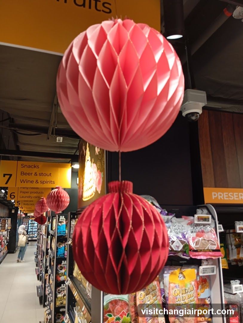 Red Honeycomb Decorations in Store Aisle
