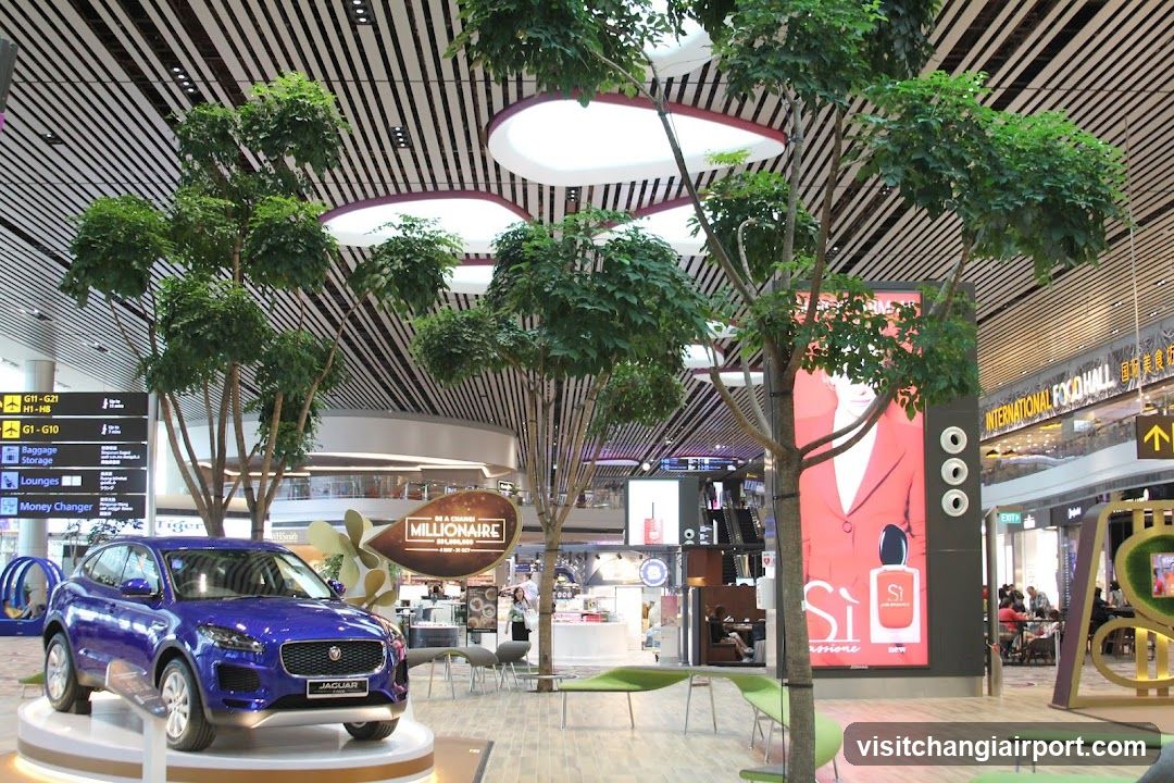 Airport Interior with Car Display and Advertisements