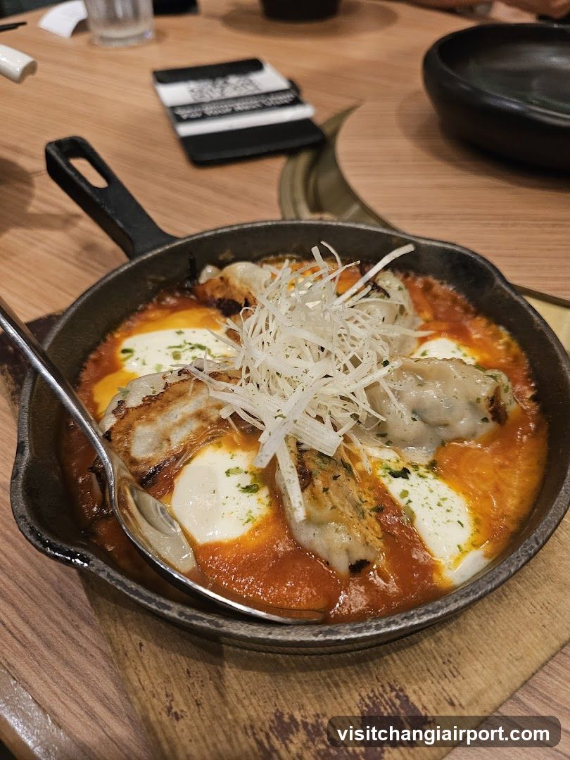 Skillet Dish with Dumplings and Cheese