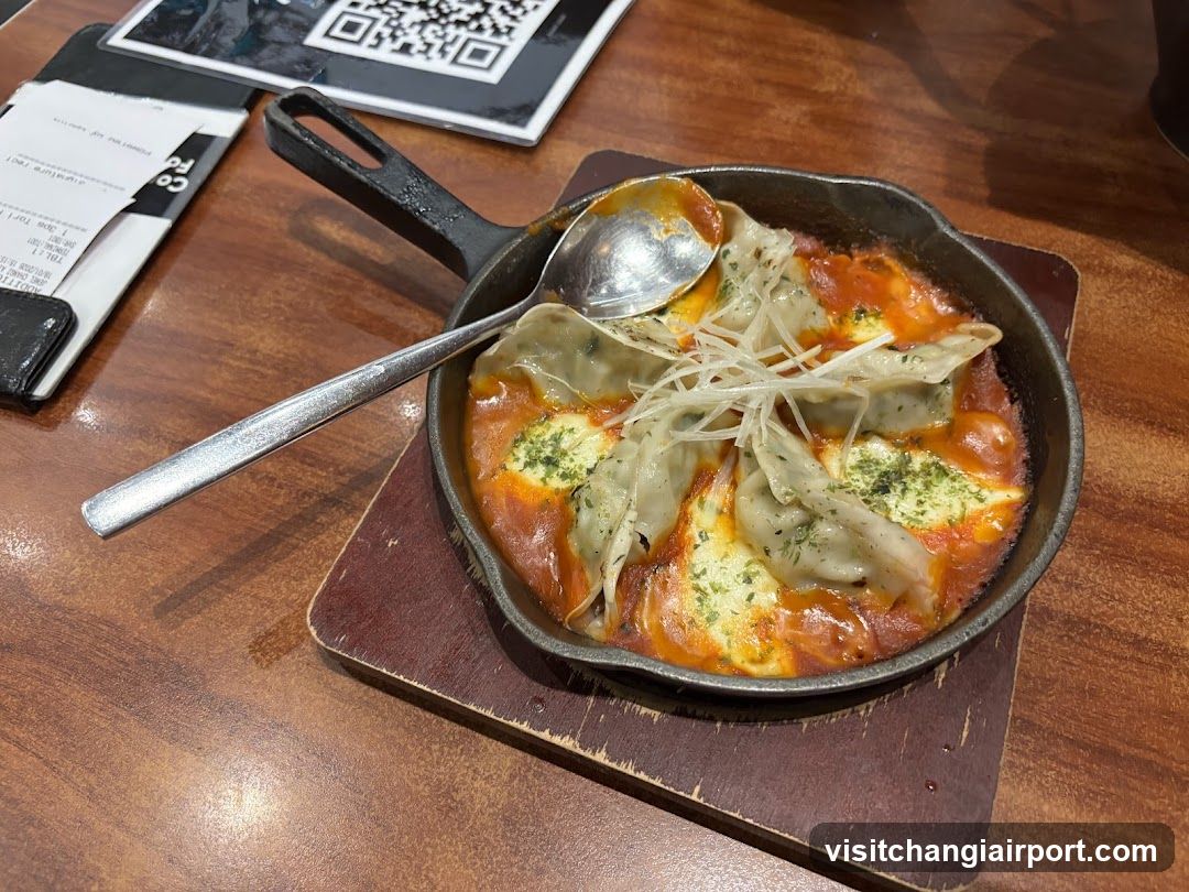 Skillet Dish with Dumplings and Sauce