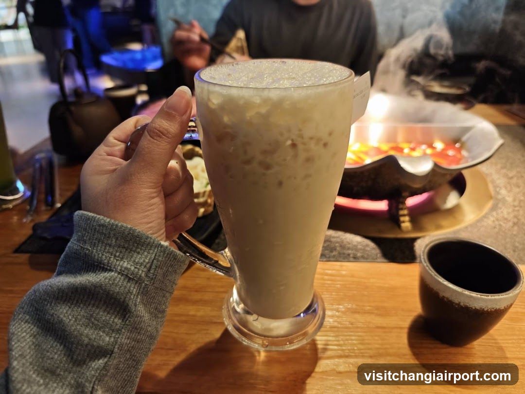 Dining Scene with Hot Pot and Drink