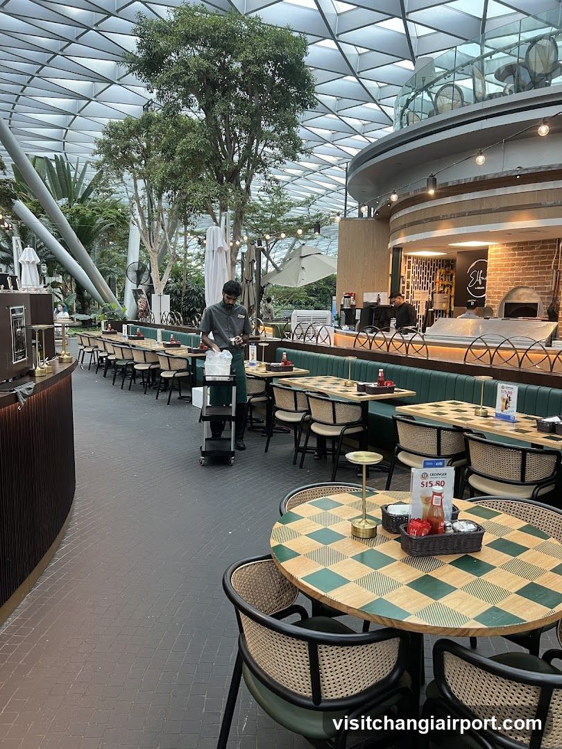 Indoor Dining Area with Staff and Tables