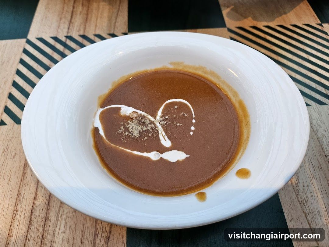 Bowl of Soup with Cream Swirl