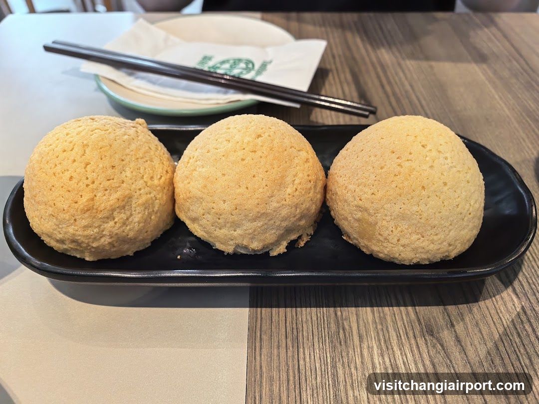 Steamed Buns on a Black Plate