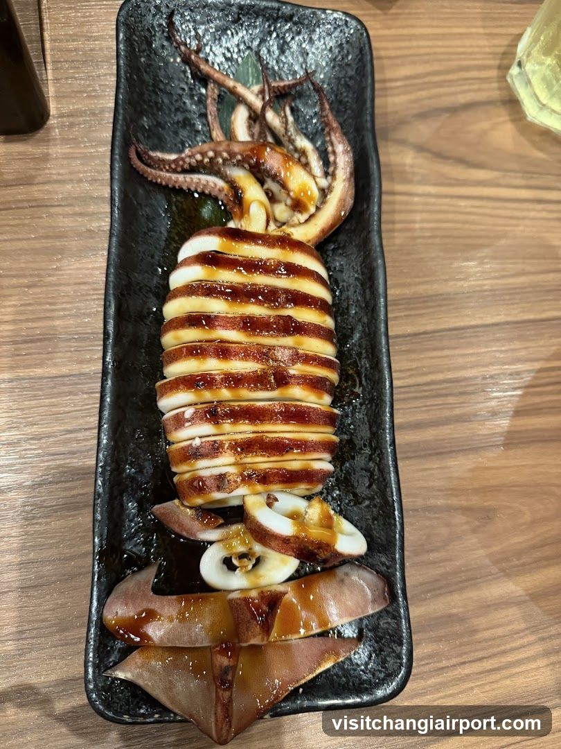Squid Dish on Black Plate