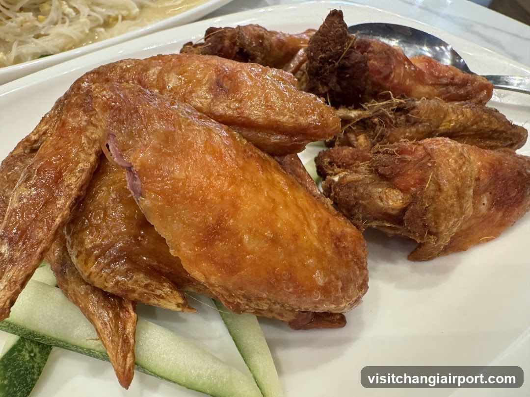 Fried Chicken Wings with Cucumber Slices