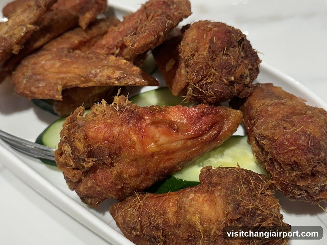 Fried Chicken Wings with Cucumber Slices