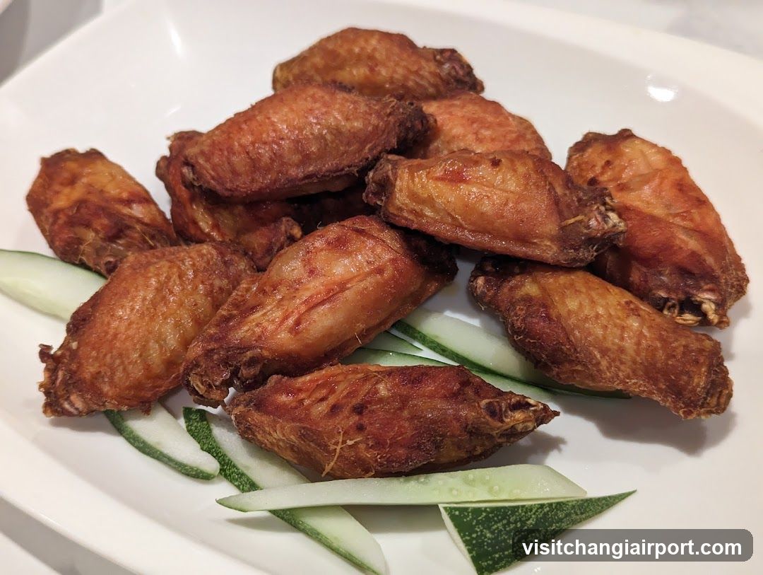 Fried Chicken Wings with Cucumber Slices