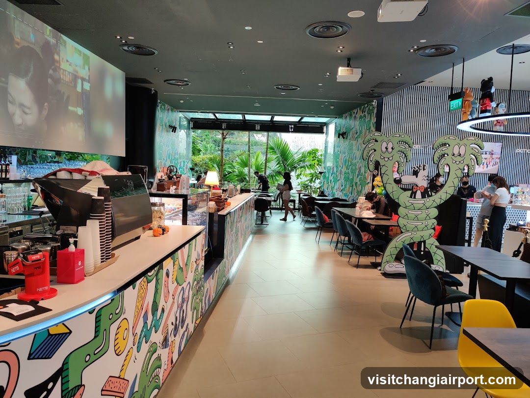 Interior of a colorful café with dinosaur-themed decor