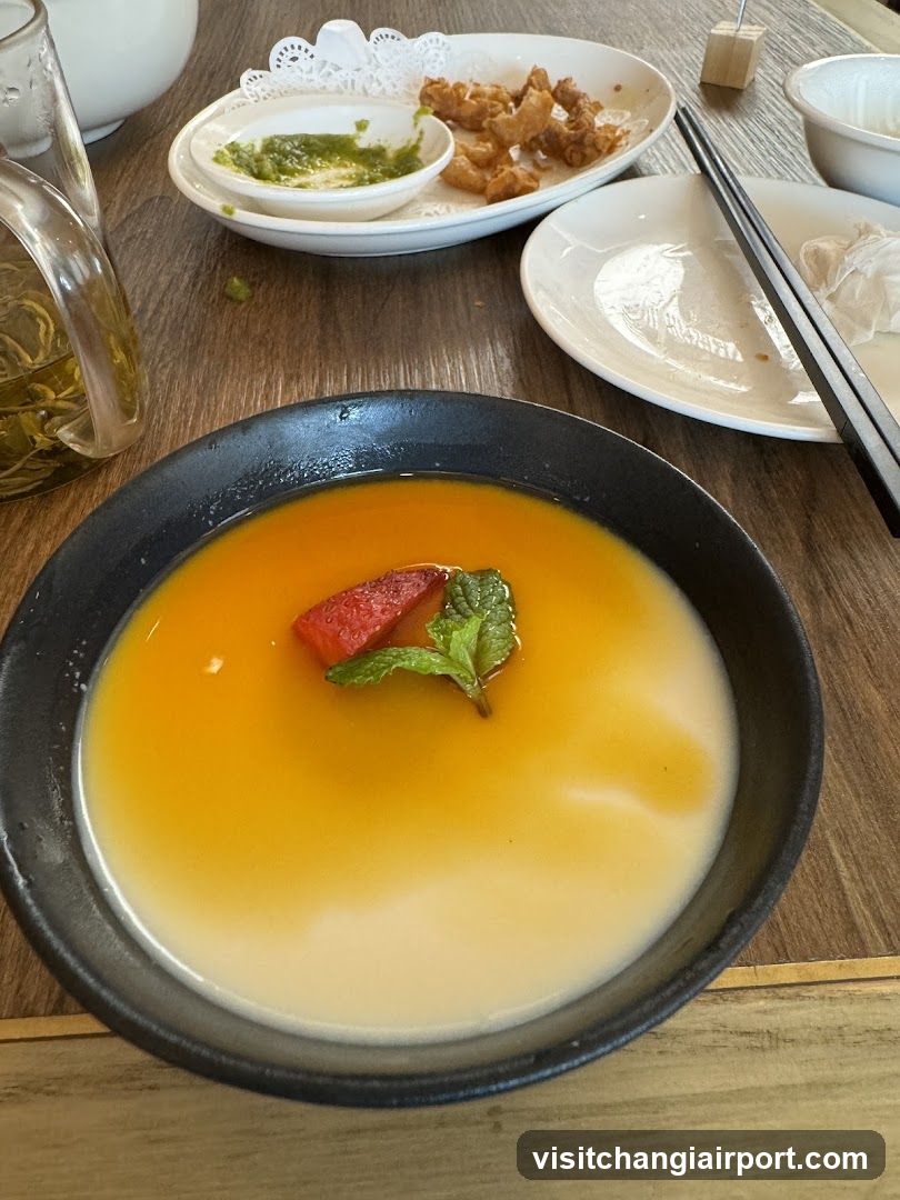 Dining Table with Soup and Side Dishes