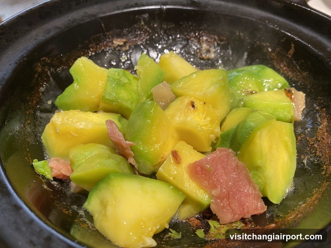 Sautéed Avocado and Pineapple in Clay Pot