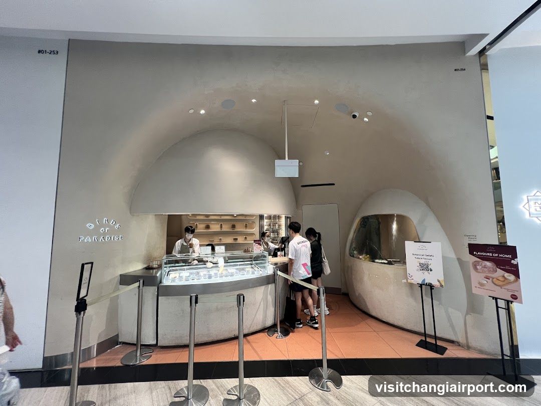 Interior of a bakery or cafe with customers ordering
