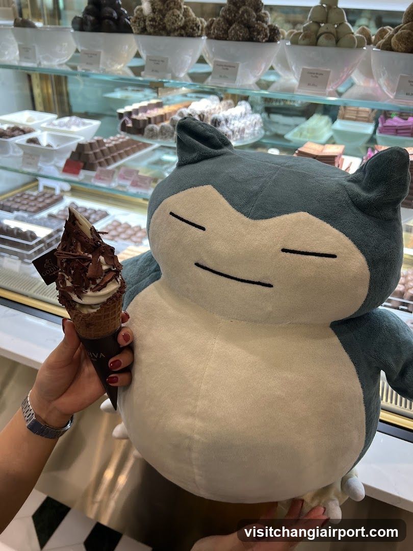 Snorlax plushie with ice cream cone in a confectionery shop