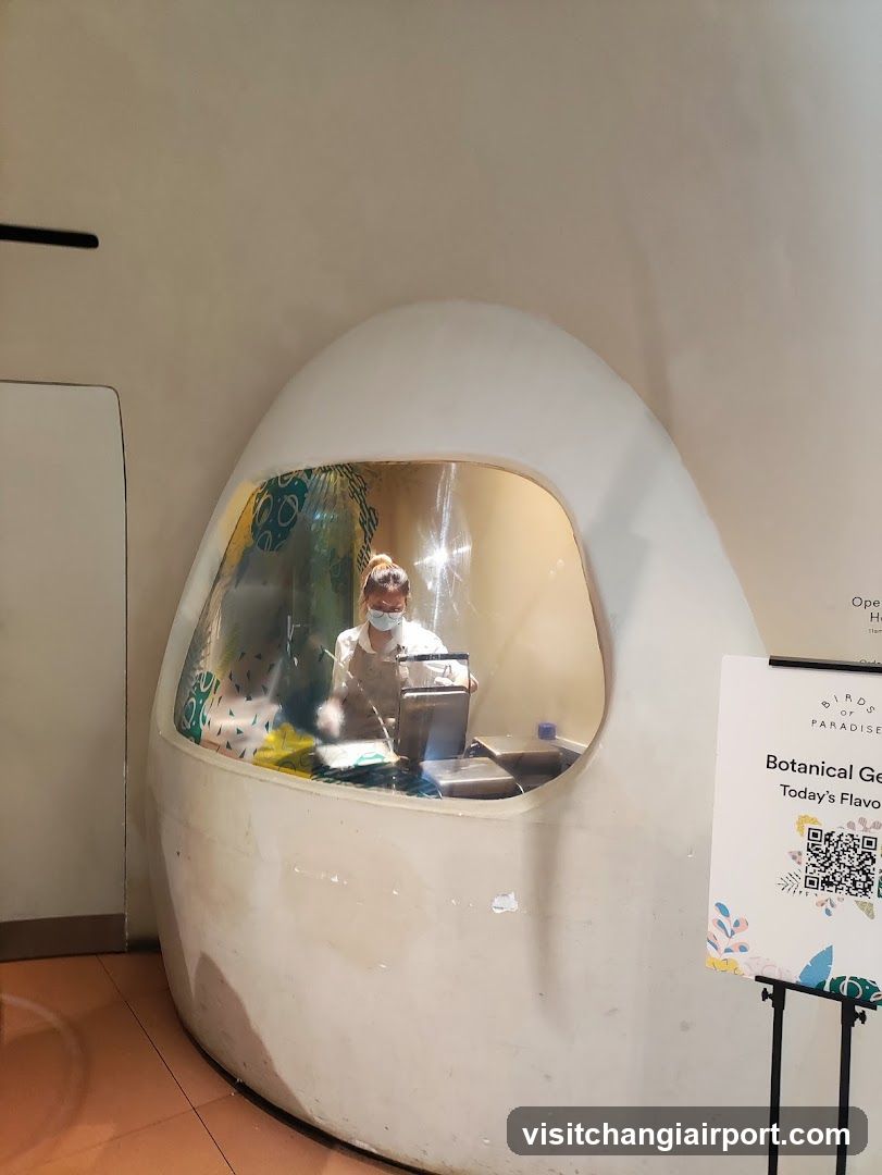 Egg-shaped kiosk with staff inside
