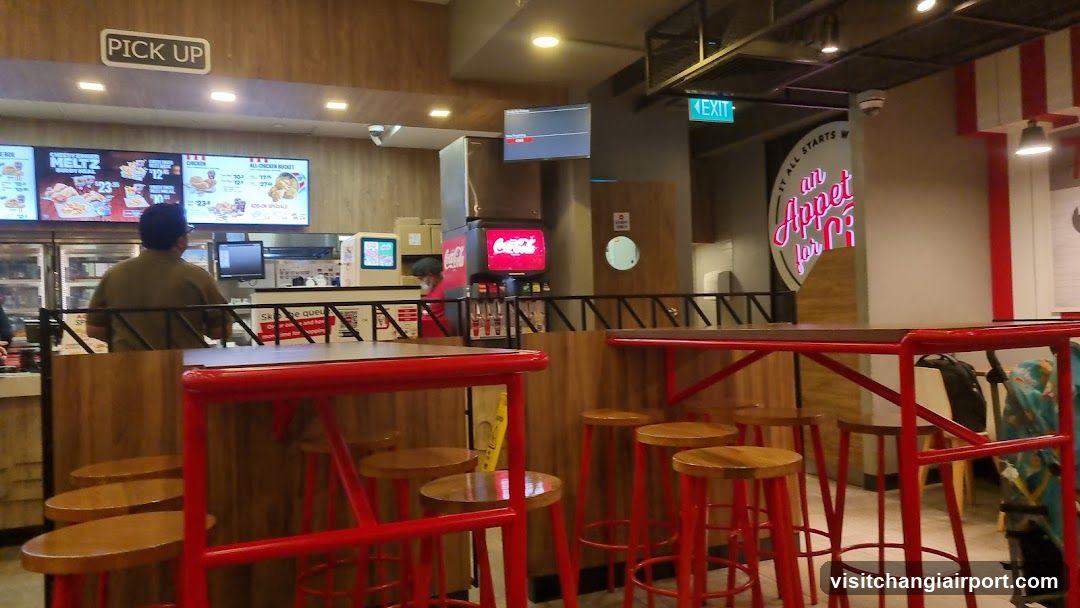 Restaurant Interior with Red Tables and Menu Boards