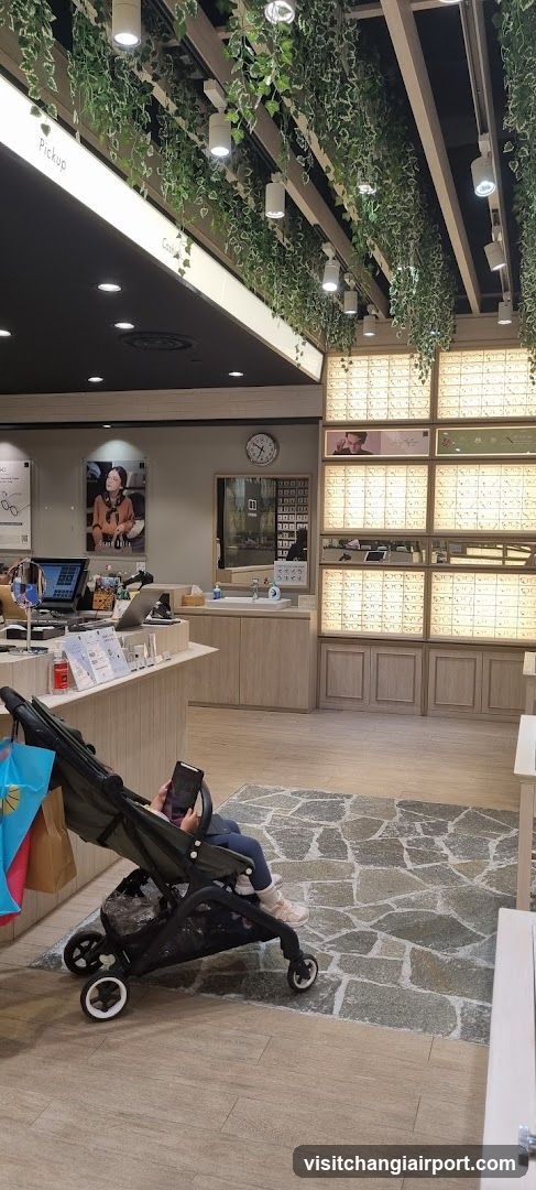 Interior of an optical store with baby stroller