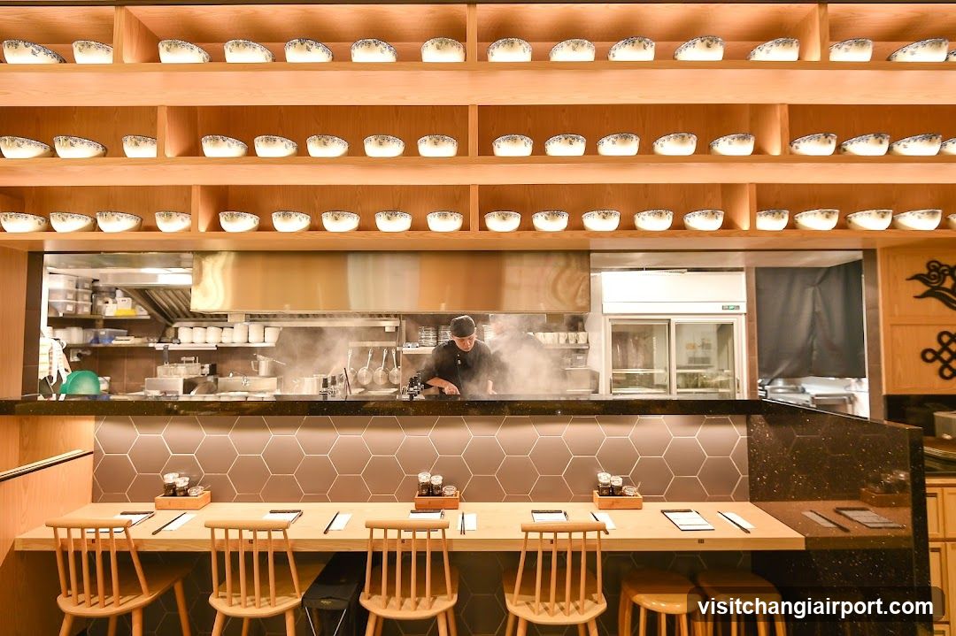 Restaurant Interior with Chef and Bowls Display