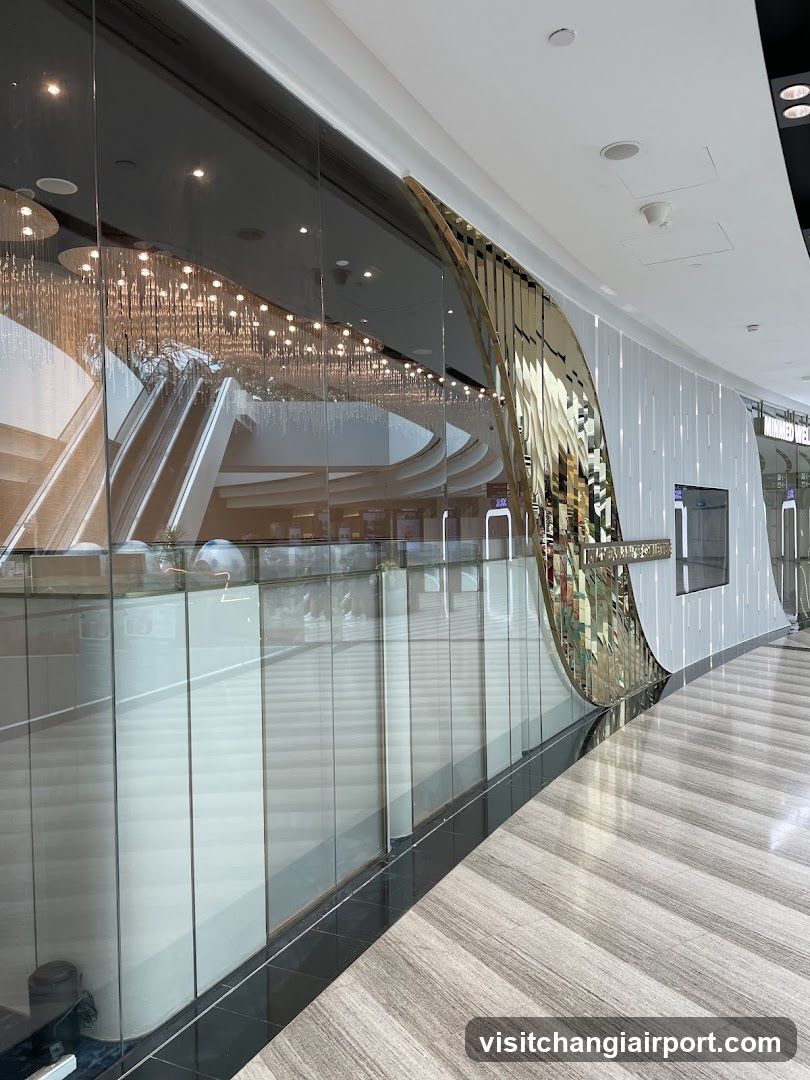 Modern Interior Corridor with Glass Wall and Decorative Sculpture