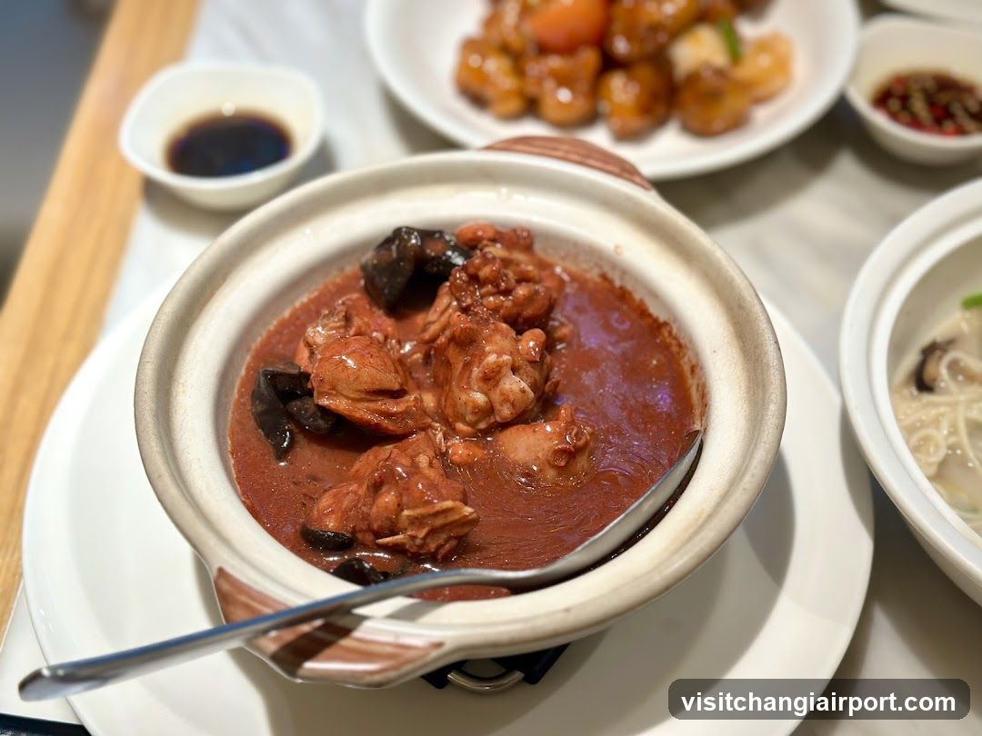 Cantonese-style claypot chicken stew with side dishes