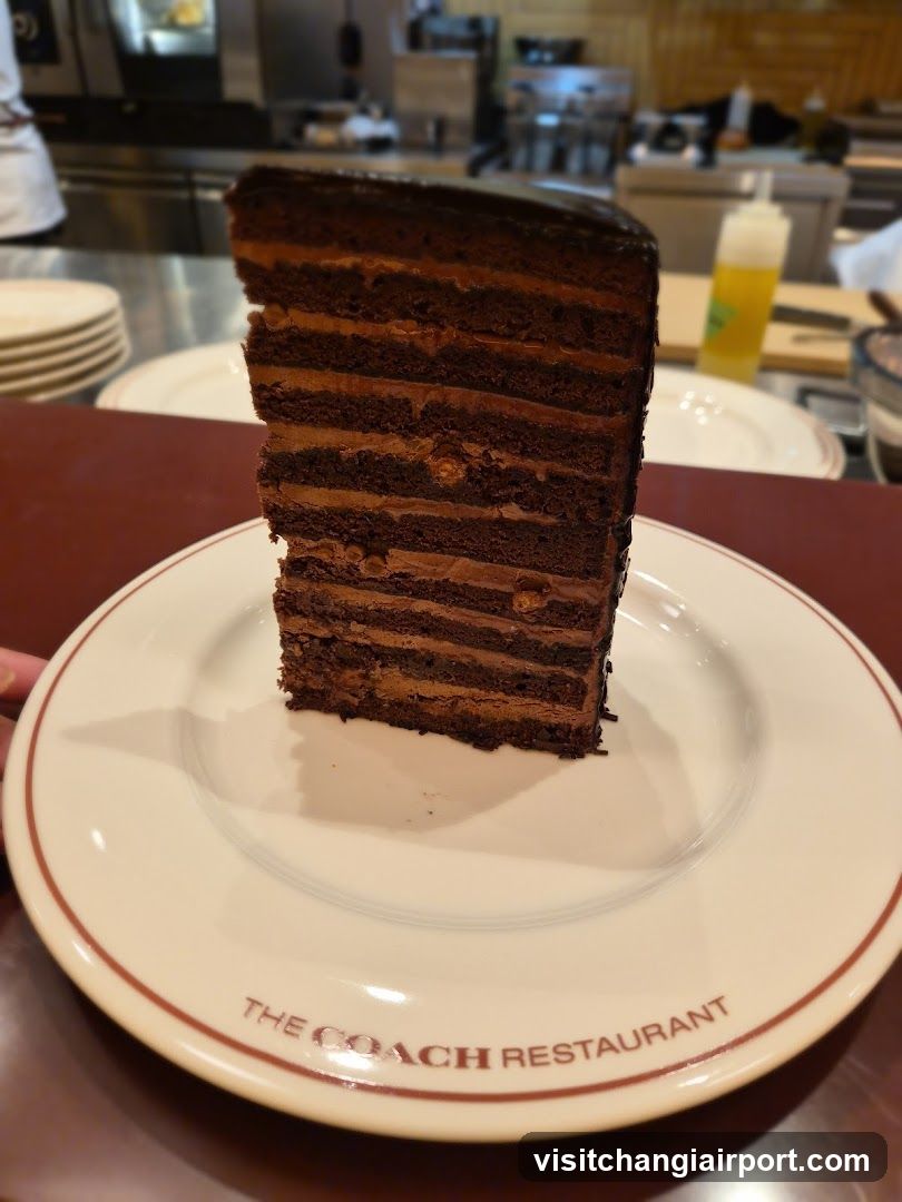 Slice of Layered Chocolate Cake at The Coach Restaurant