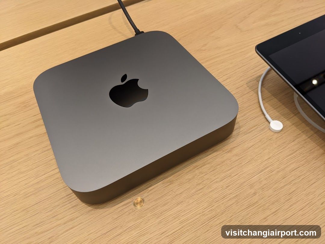 Apple Mac Mini on wooden table