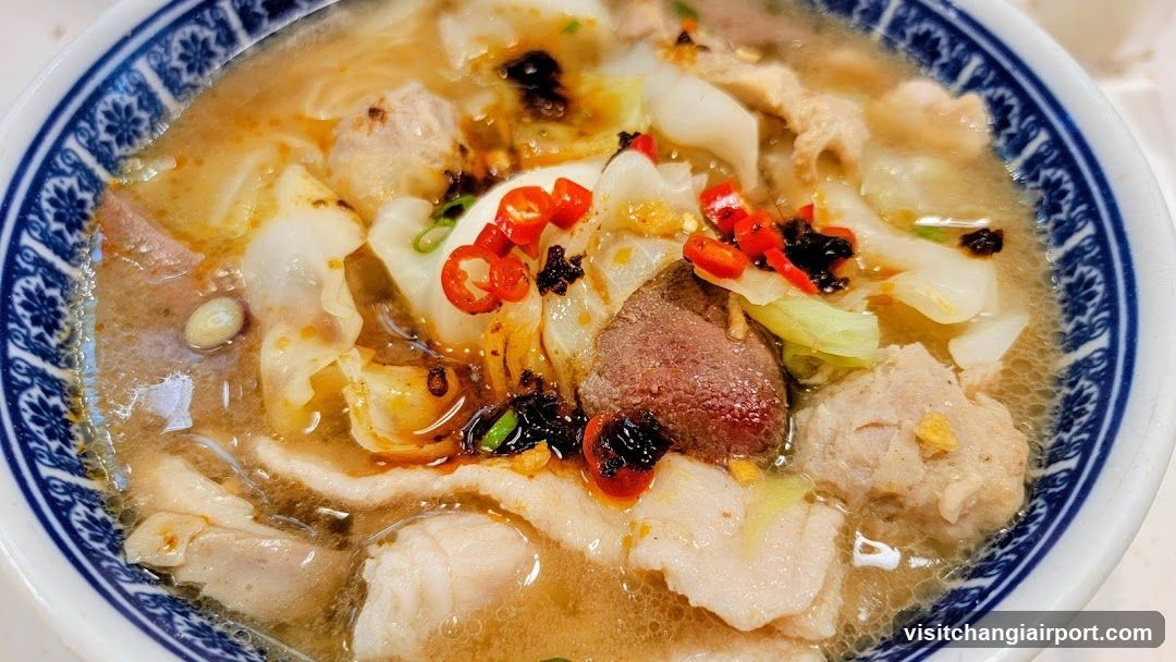 Bowl of Soup with Meat and Vegetables