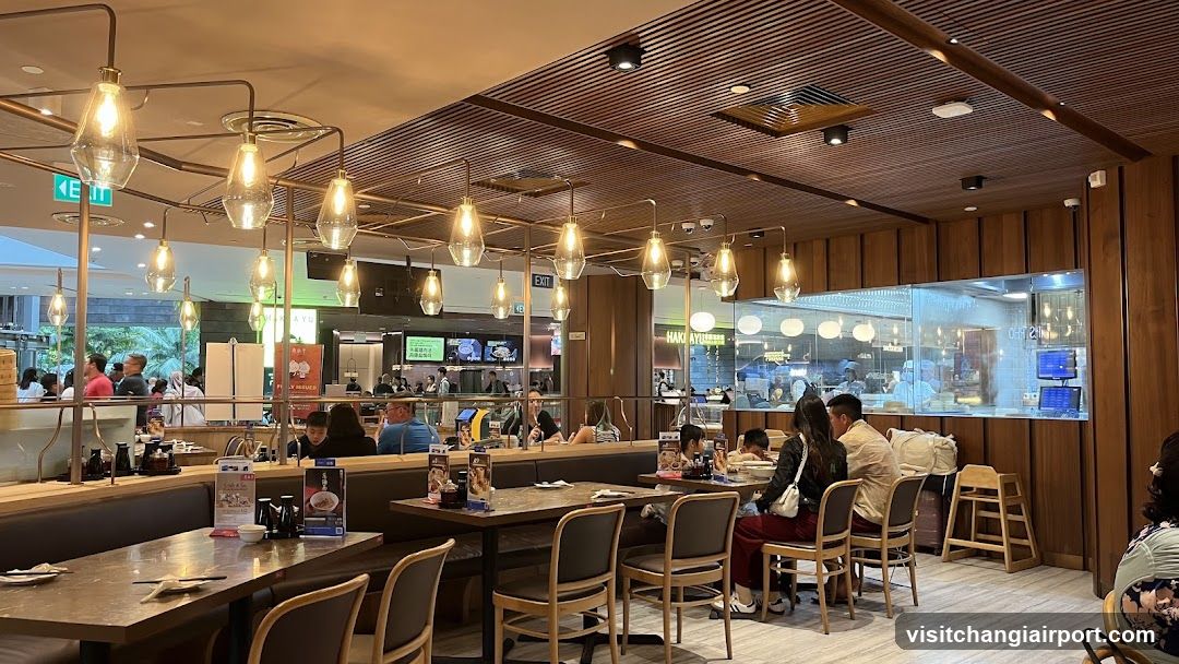 Restaurant Interior with Hanging Lights and Dining Area