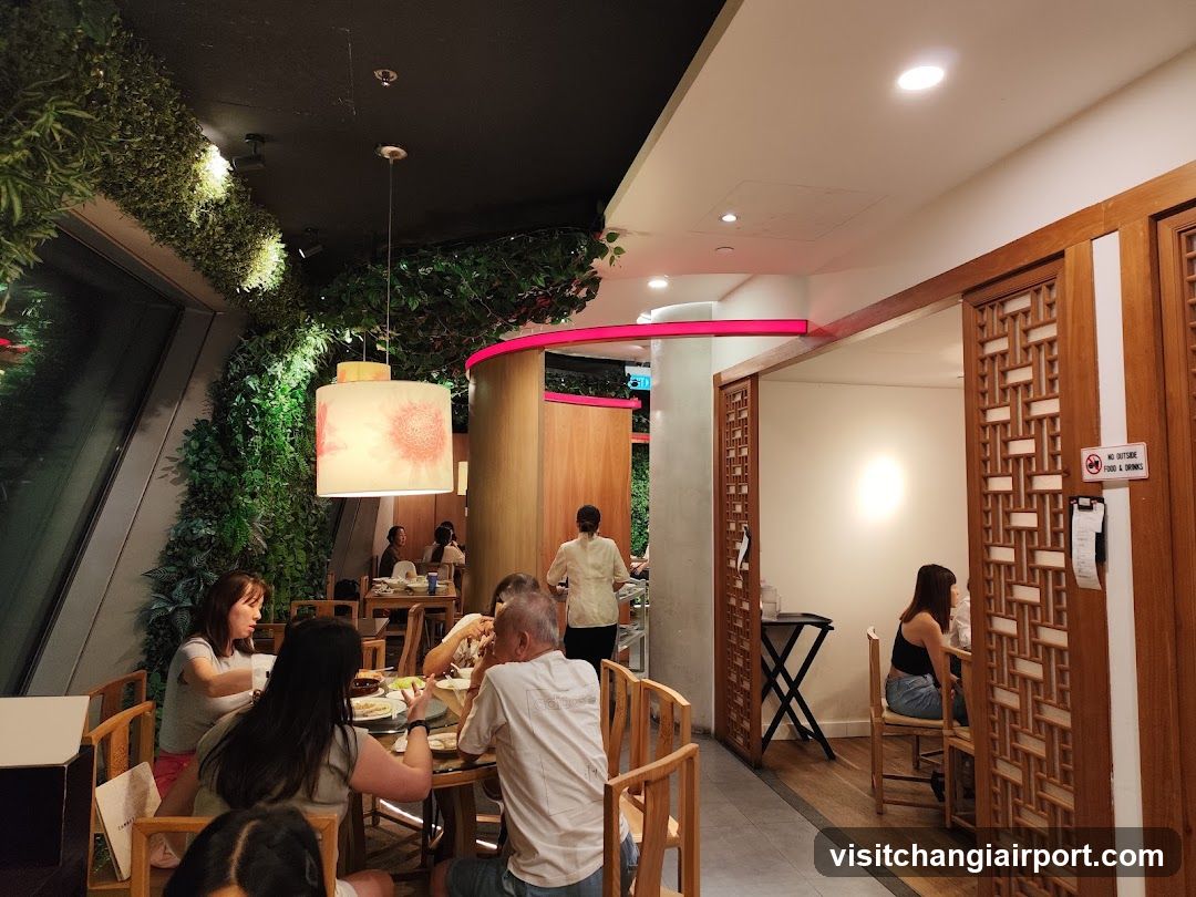Dining Interior with Greenery and Wooden Decor